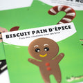 Carte d’apprentissage active Noël sur la route avec biscuit pain d’épice souriant pour pauses actives assises.