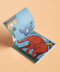 Livre interactif jungle Les Bougeottes ouvert sur une page avec un élément illustré, fond orange.