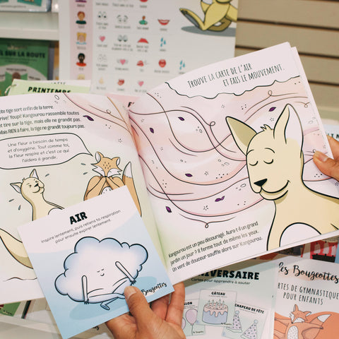 Livre interactif pour faire du yoga avec les jeunes accompagné d'une carte. 